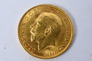 Gold Sovereign - A George V 1913 full sovereign, 8 grams.