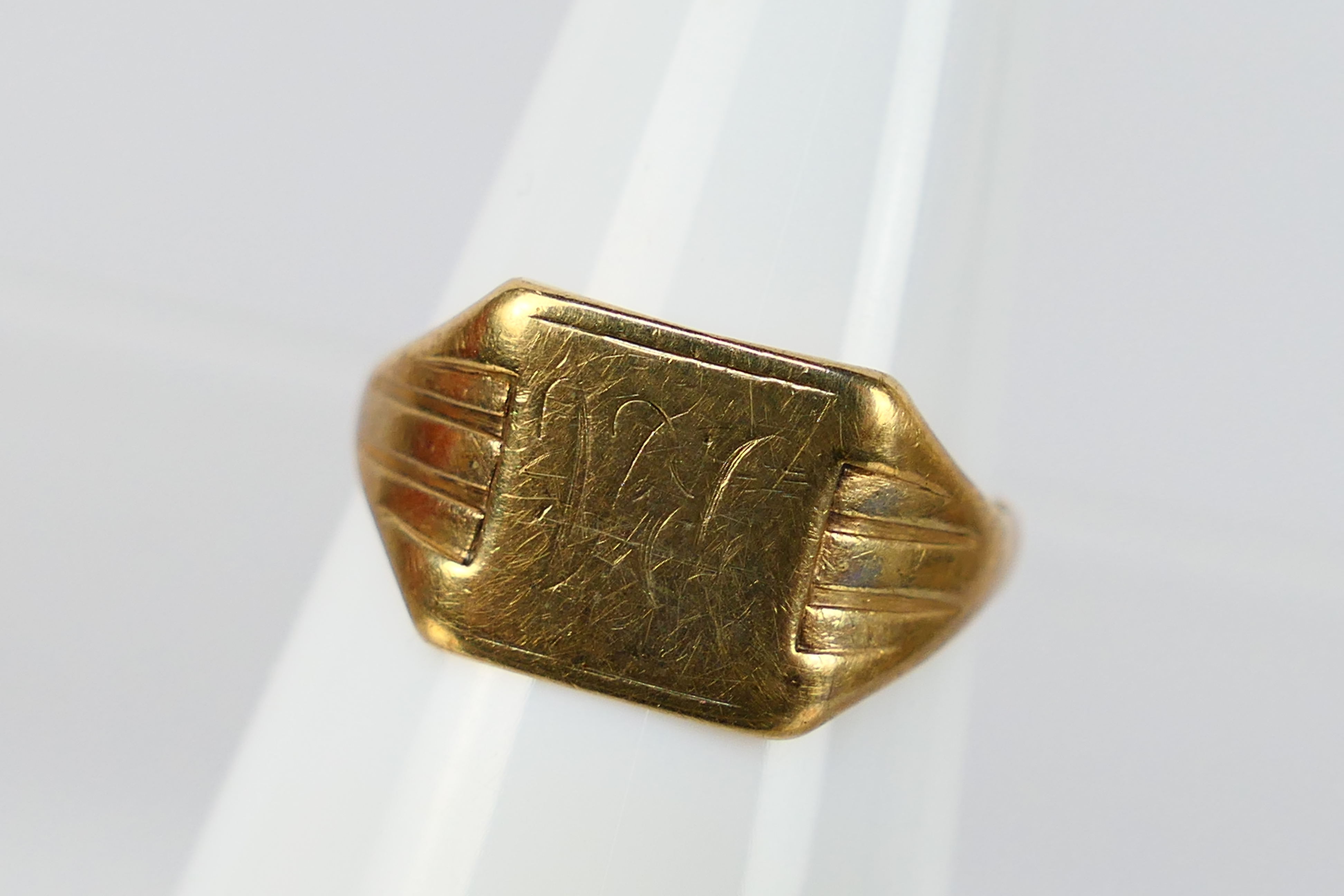 Scrap Gold - A 9ct yellow gold ring (shank cut), 2.4 grams.