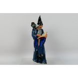 A Royal Doulton figure # HN2877, The Wizard, approximately 25 cm (h).