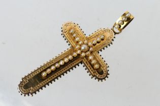 A yellow metal and seed pearl crucifix pendant, probably Portuguese, assessed as 14ct, 7.