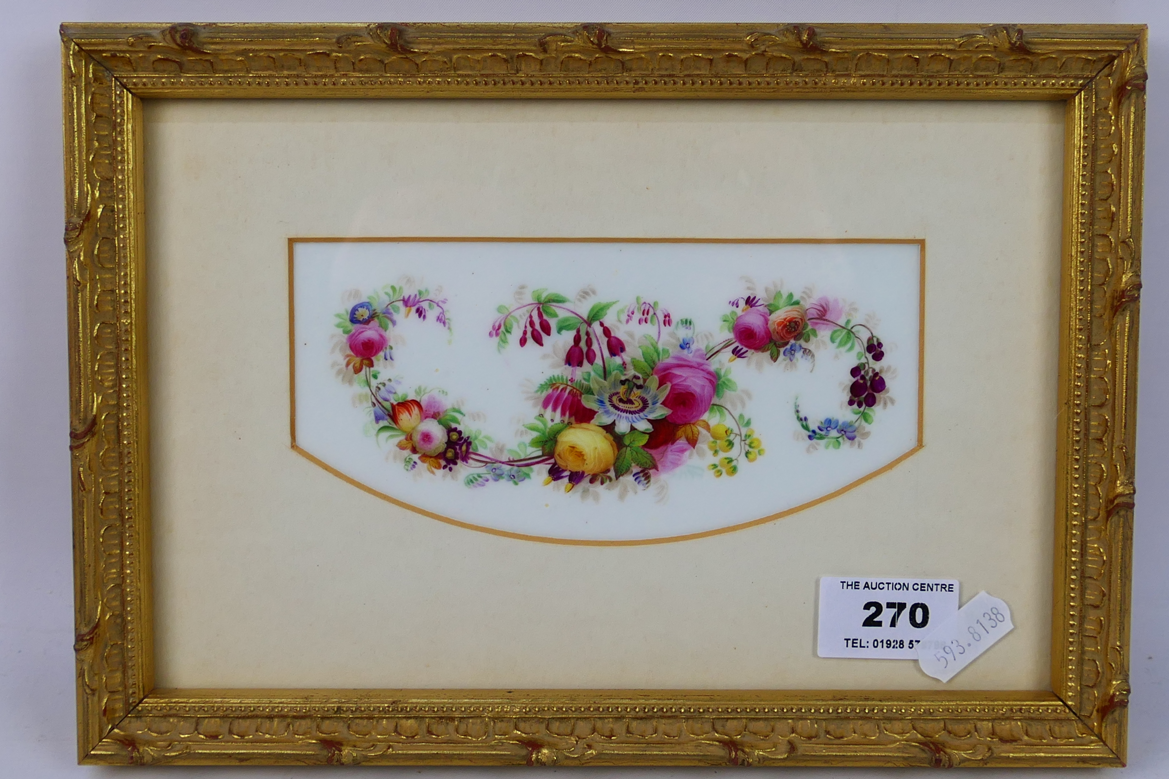 A framed Copeland & Garrett porcelain plaque with hand painted floral decoration,