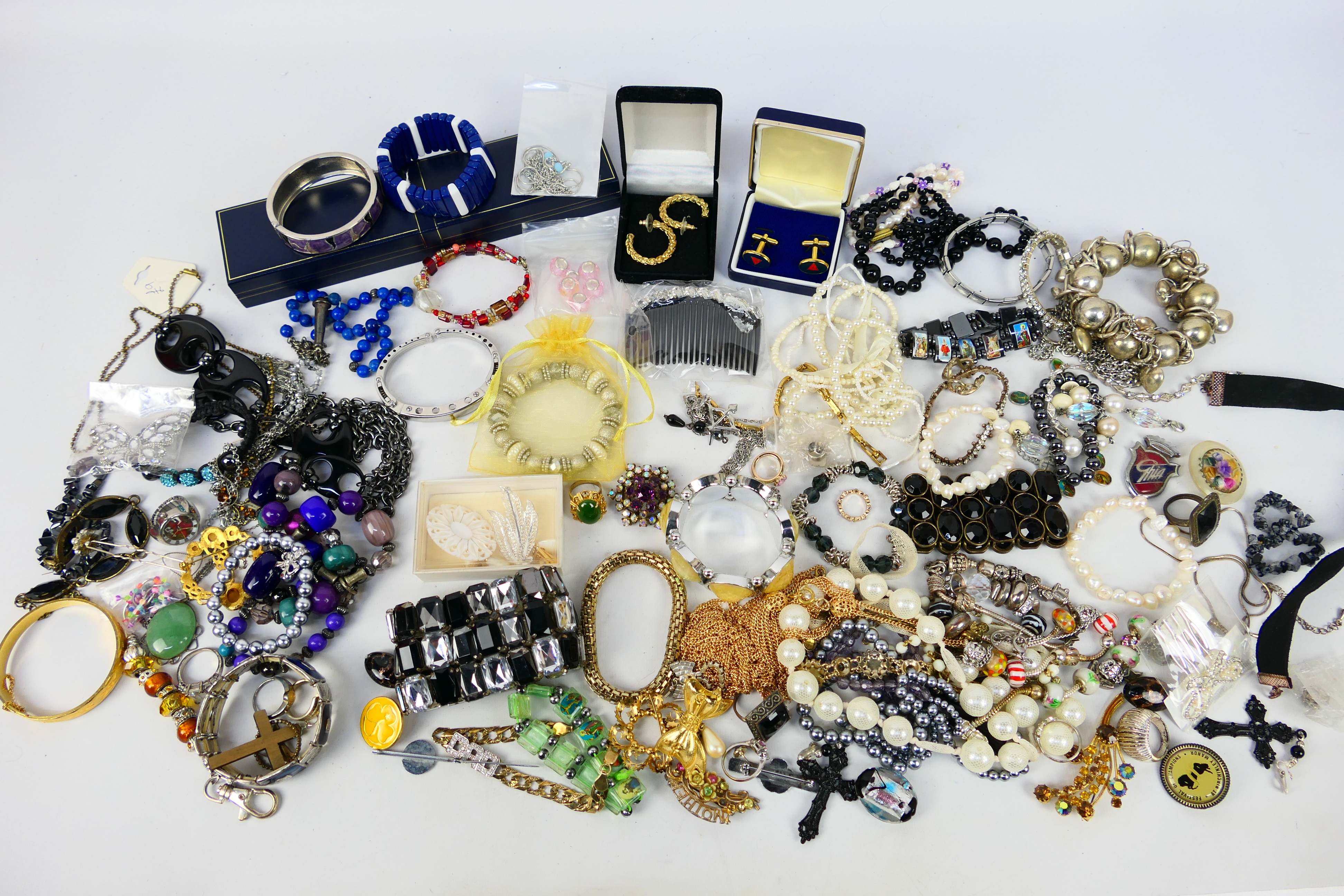 A varied collection of costume jewellery, some pieces stamped 925.