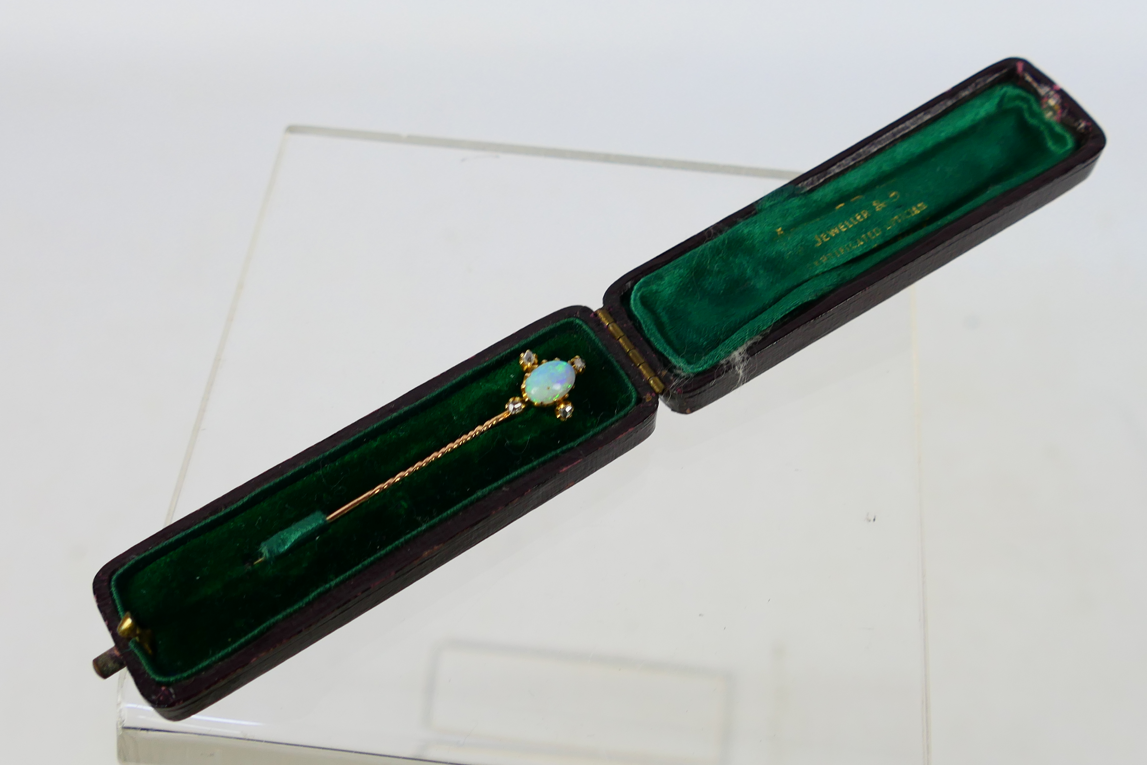 An Edwardian white opal and diamond stick pin contained in fitted case, 1.3 grams. - Image 3 of 4