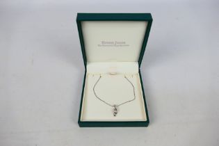 A 9ct white gold diamond set pendant on 9ct white gold chain (44 cm length),