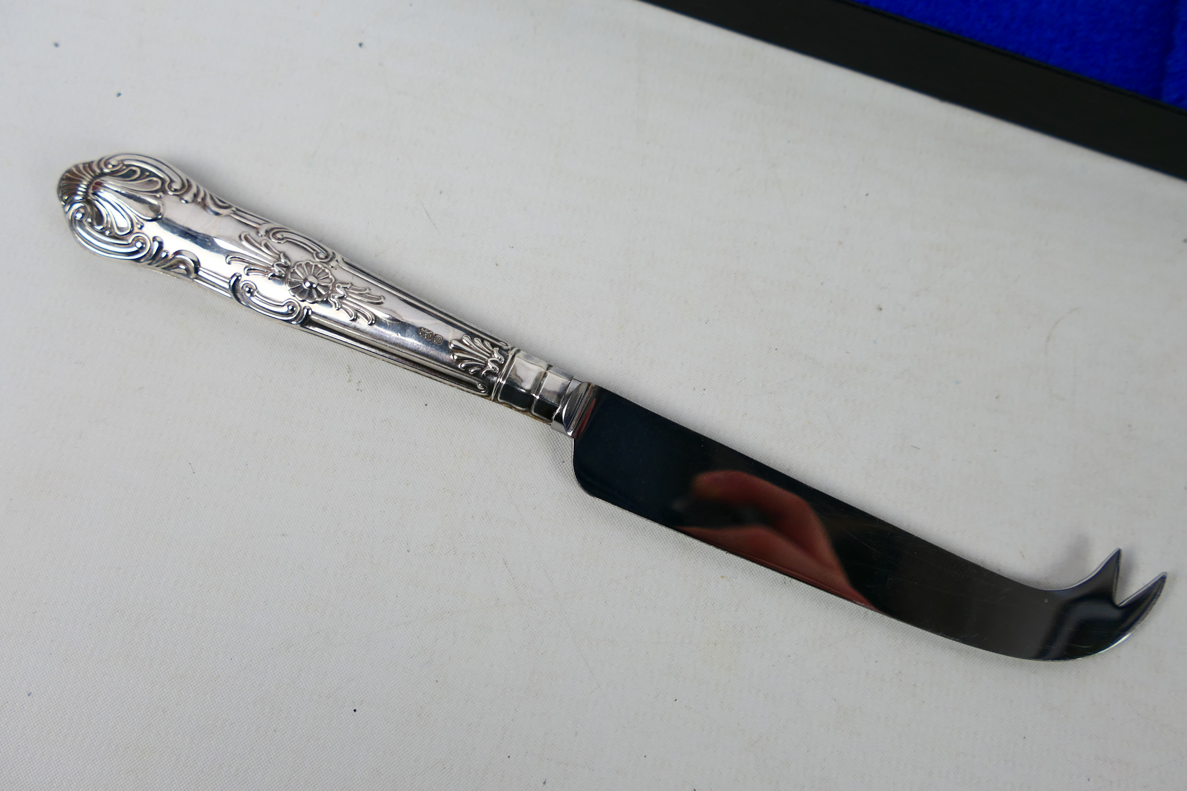 A silver handled cheese knife in original box. Sheffield assay 1983. Harrison Brothers makers mark. - Image 2 of 6