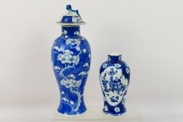 A Chinese blue and white jar and cover, decorated with prunus,