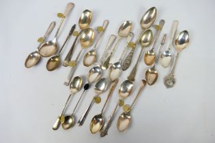 A collection of silver spoons, various assay and date marks, approximately 282 grams / 9 ozt.