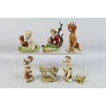 A collection of small Capodimonte figures / groups to include Giuseppe Cappe,