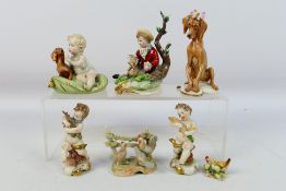A collection of small Capodimonte figures / groups to include Giuseppe Cappe,