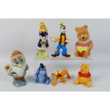 Disney - Figurines - Ceramics - An assortment of 7 unboxed Disney ceramic figurines including