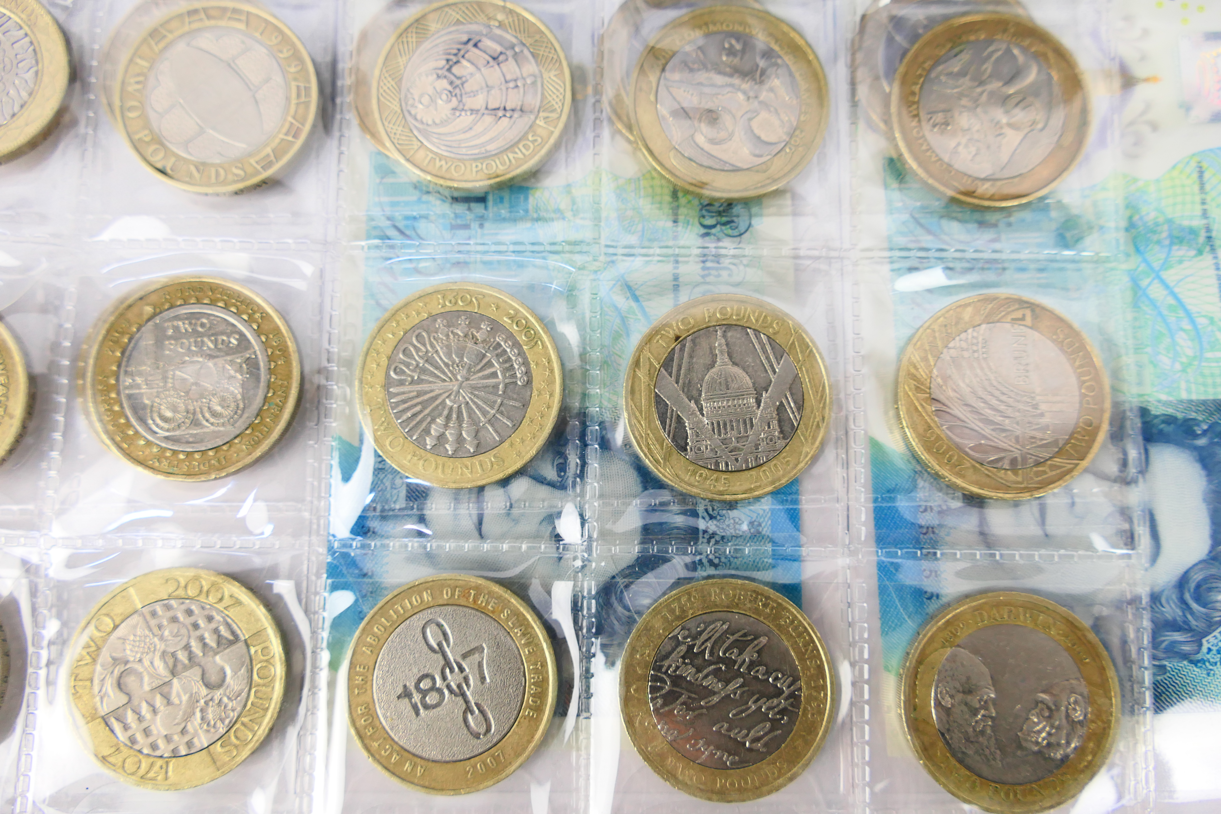 A collection of 37 collectable Two Pound Coins (£2) and two Series G (I) Five Pound Notes with - Image 4 of 7