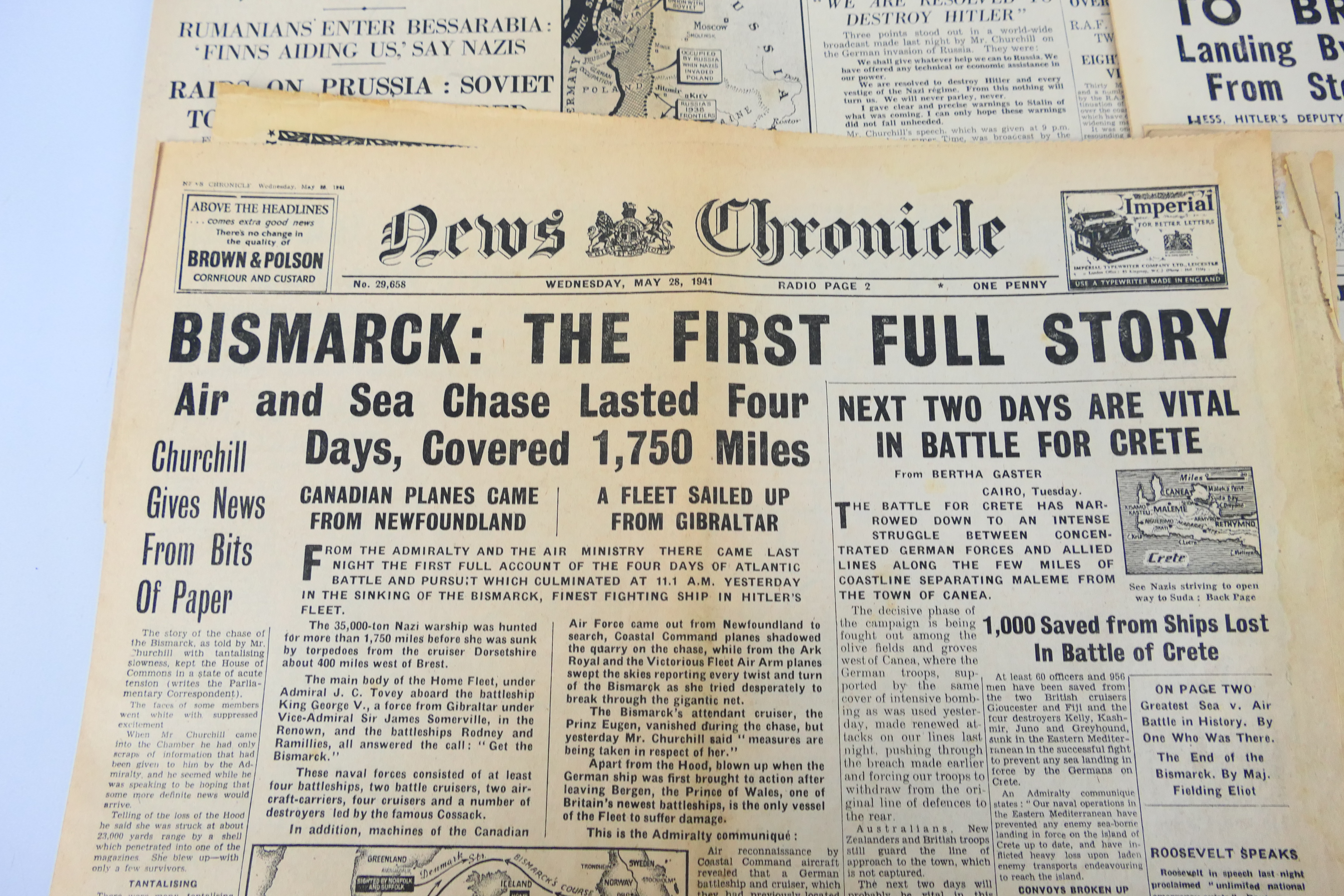 A collection of vintage newspapers with front pages detailing historically significant events to - Image 3 of 6