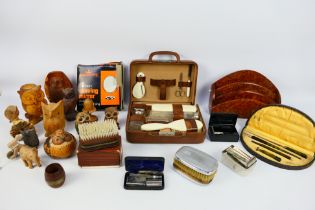 Lot to include a quantity of treen, travel grooming kit, cased desk set and other.