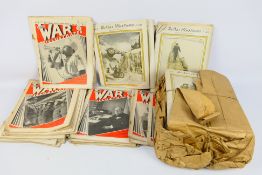 A collection of The War Illustrated magazines.