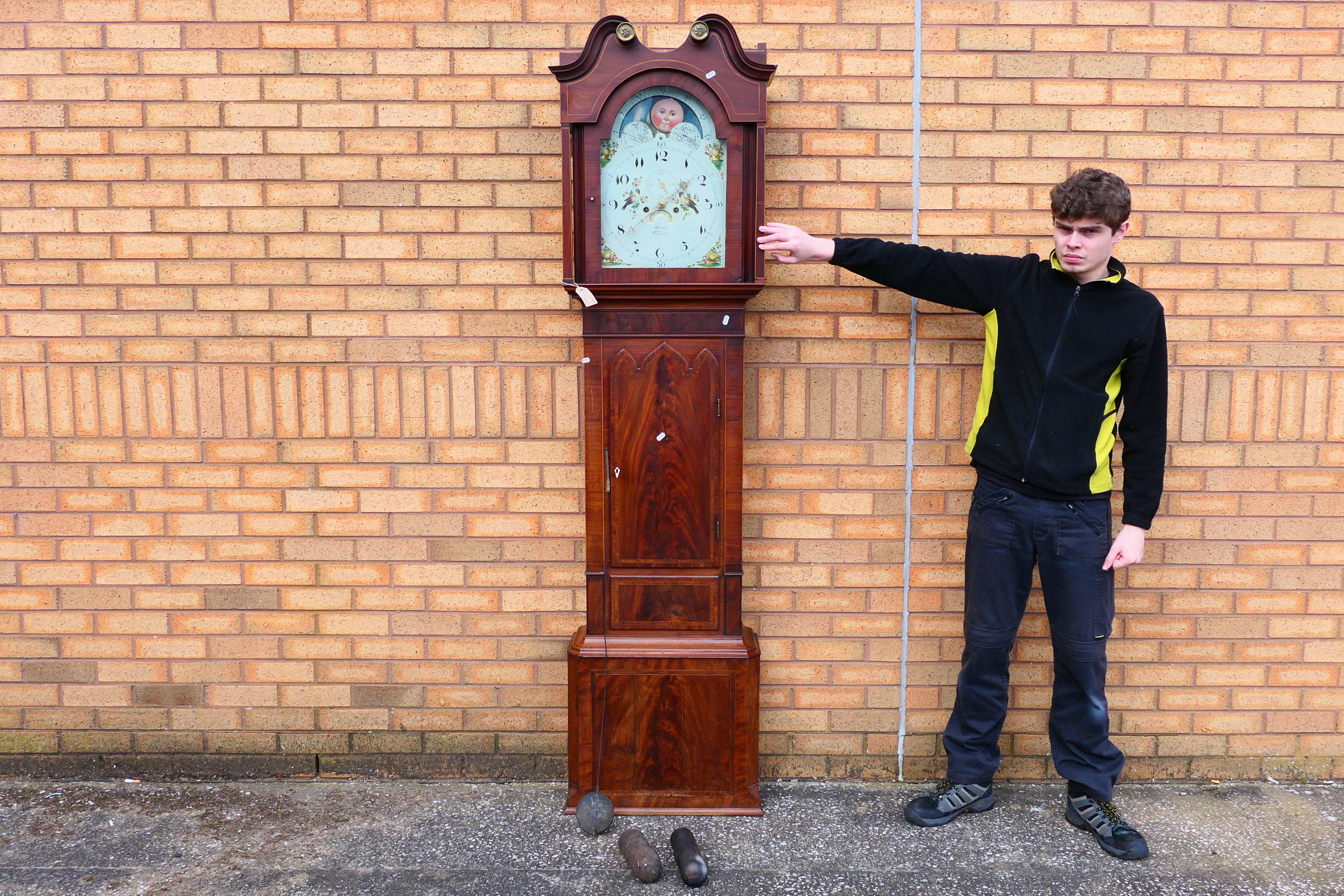 An early 19th century mahogany cased 8-day longcase clock, the case with inlaid stringing,
