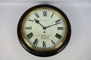 A 12 inch fusee dial clock, dark stained case, white dial marked for GWR and R Jones & Co, Makers,