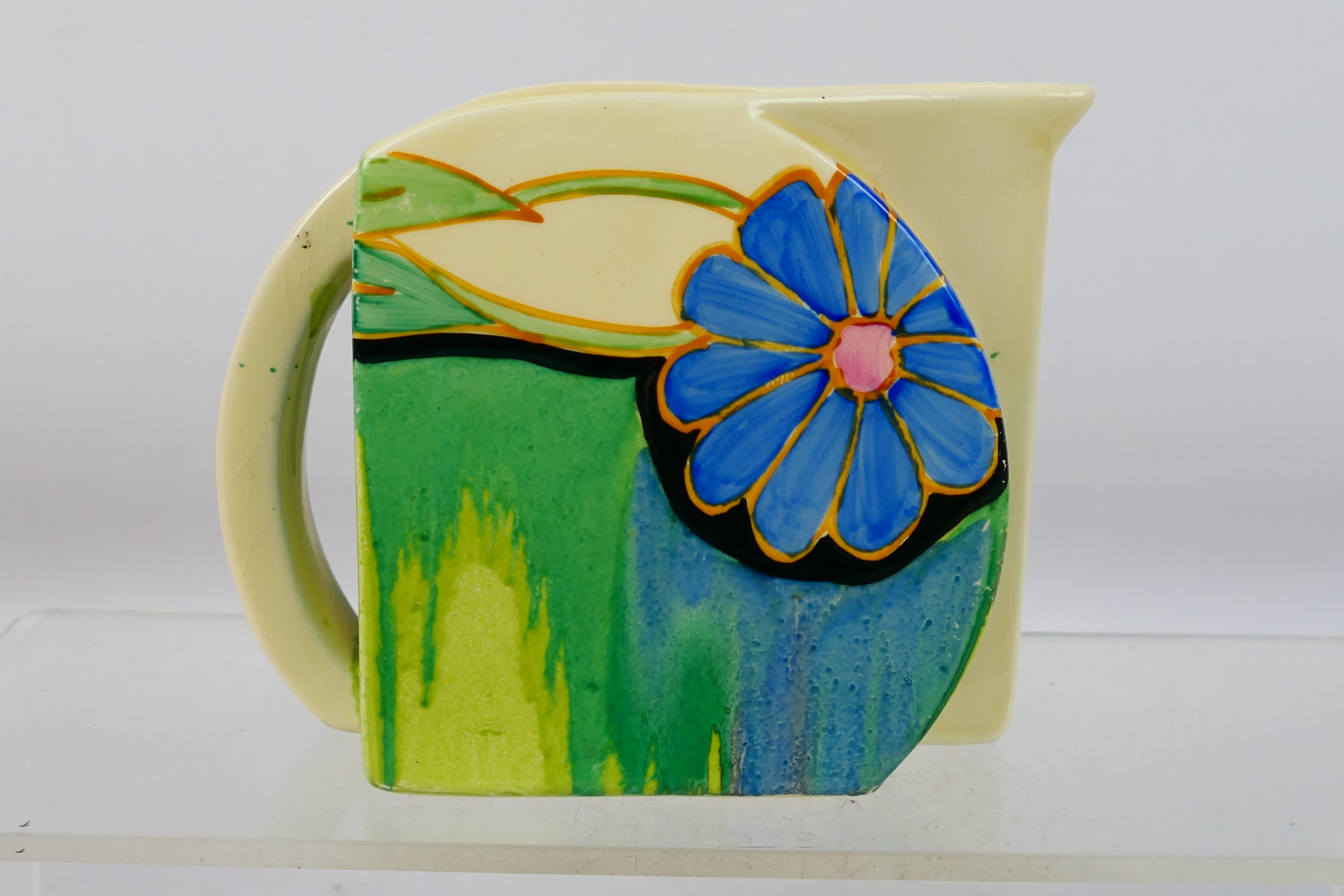 Clarice Cliff - A Clarice Cliff Bizzare floral hand painted jug.