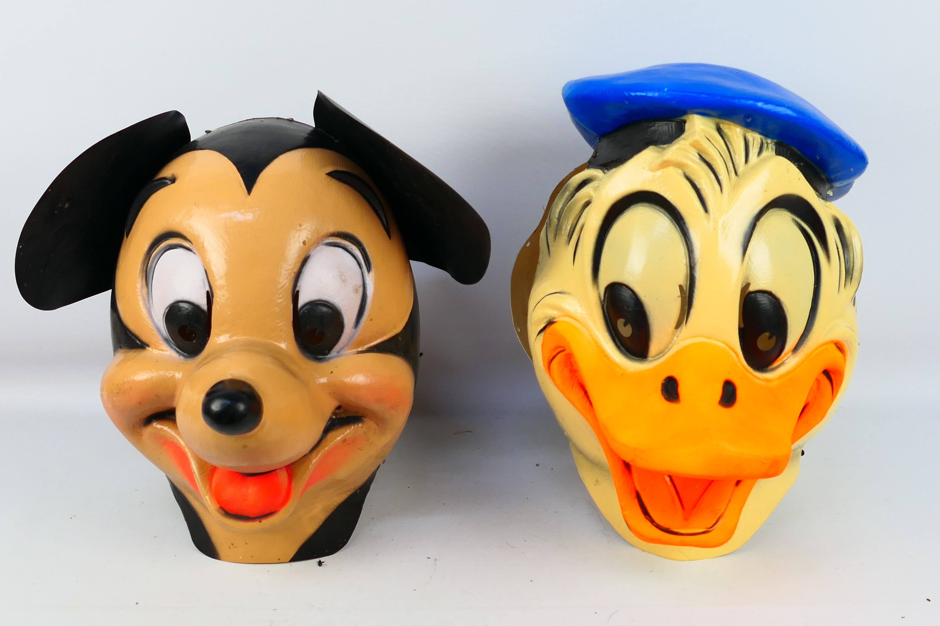 Disney - Mask - Costume - A pair of Disney Full head plastic masks comprising of Mickey Mouse and