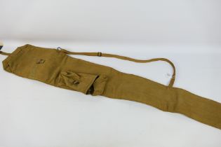 A British World War Two (WW2) 1942 Lee Enfield Sniper Rifle webbing cover.
