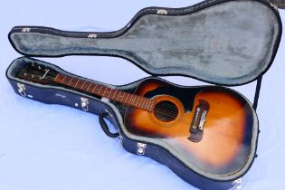 A German Framus acoustic guitar in fitted hard case, model 5/196, serial number 187**.