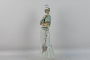Lladro - A large figure # 4893, A Walk With The Dog,