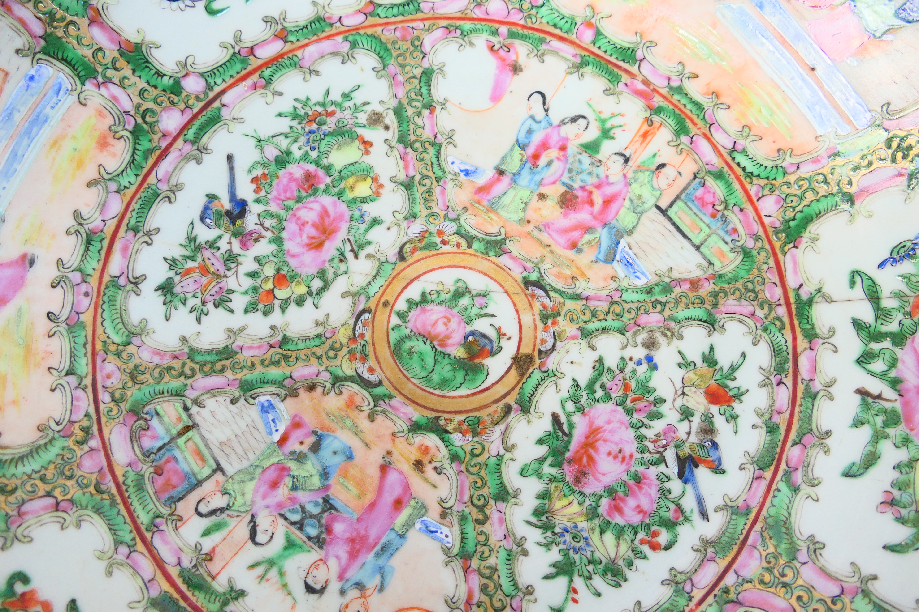 A large Cantonese famille rose punch bowl, typically decorated with panels of figures and flora, - Image 5 of 9