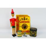 Lot to include a Coleman's Mustard enamel advertising sign, wooden Pinocchio model,