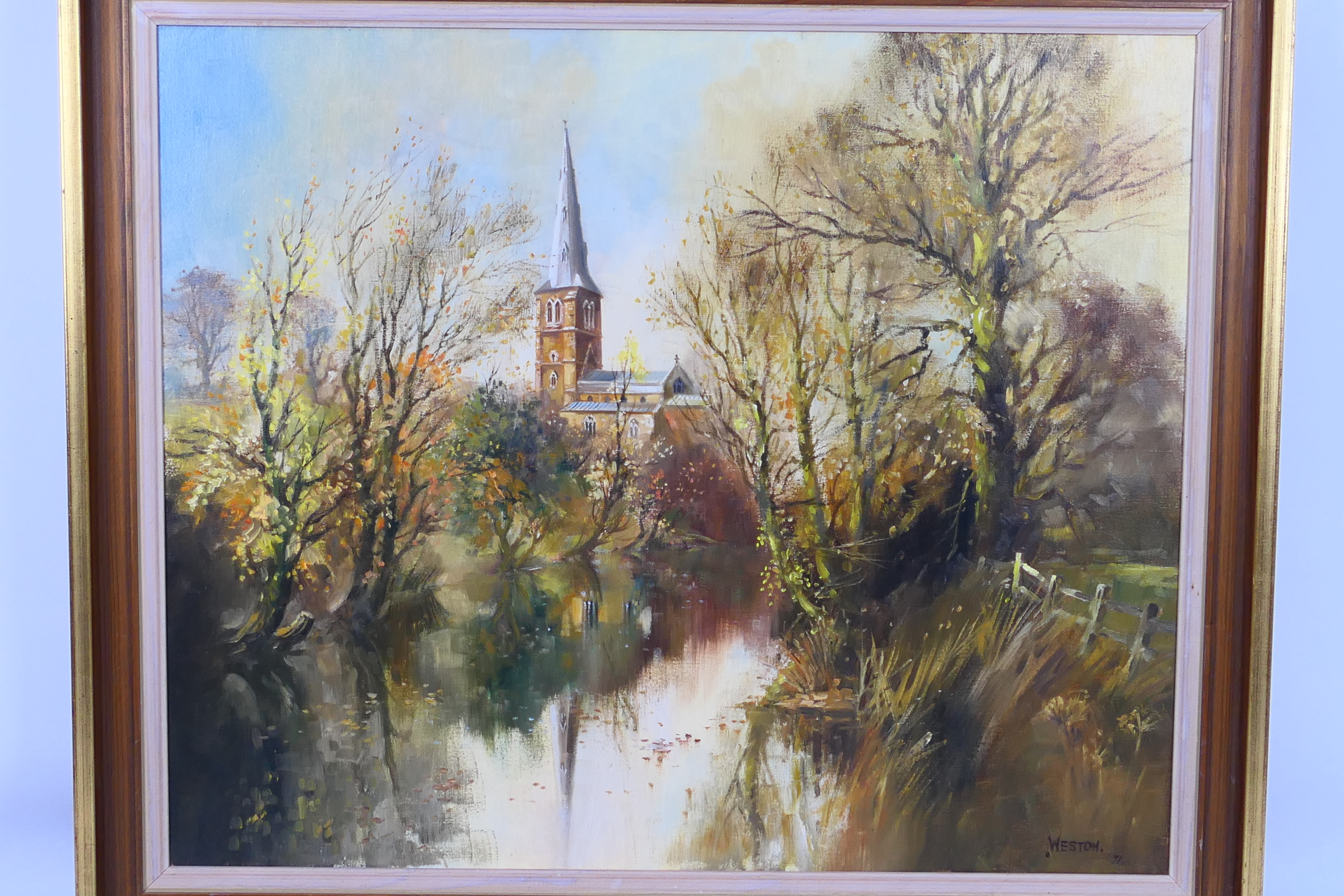 David Weston (1935 - 2011) - A framed oil on canvas landscape scene depicting a church beside a - Image 2 of 7