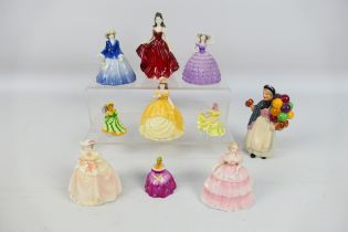 A quantity of small and miniature lady figures to include Royal Doulton,