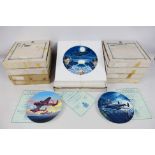 A quantity of boxed military related collector plates pertaining to The Dambusters 617 Squadron and