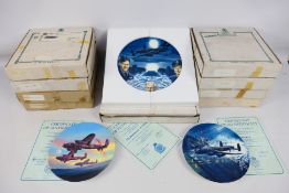 A quantity of boxed military related collector plates pertaining to The Dambusters 617 Squadron and