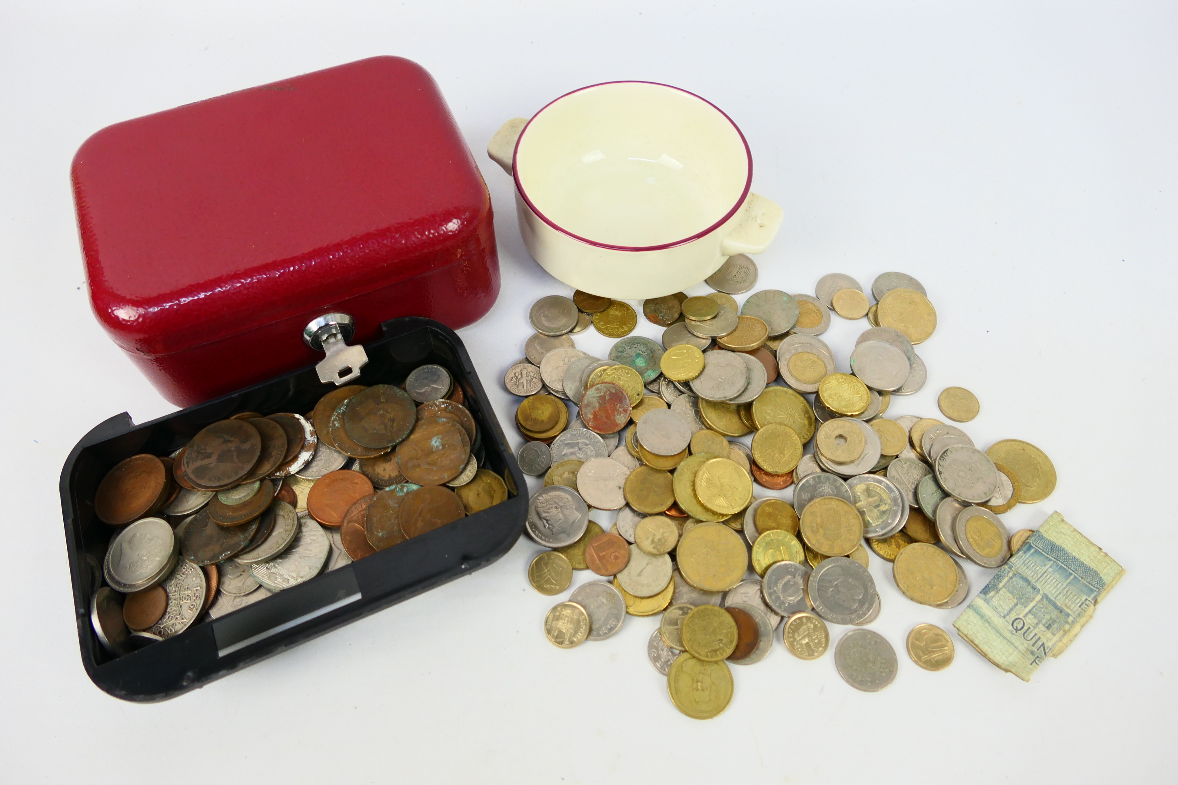 A collection of UK and foreign coins, some silver content.