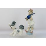 Lladro - Two figures comprising Sweet Girl, # 4987 and Skye Terrier, # 4643,