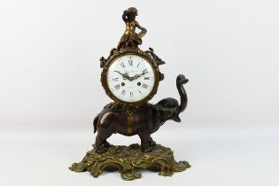 Thuillier, A Paris - a late 19th C French mantel clock of patinated bronze,