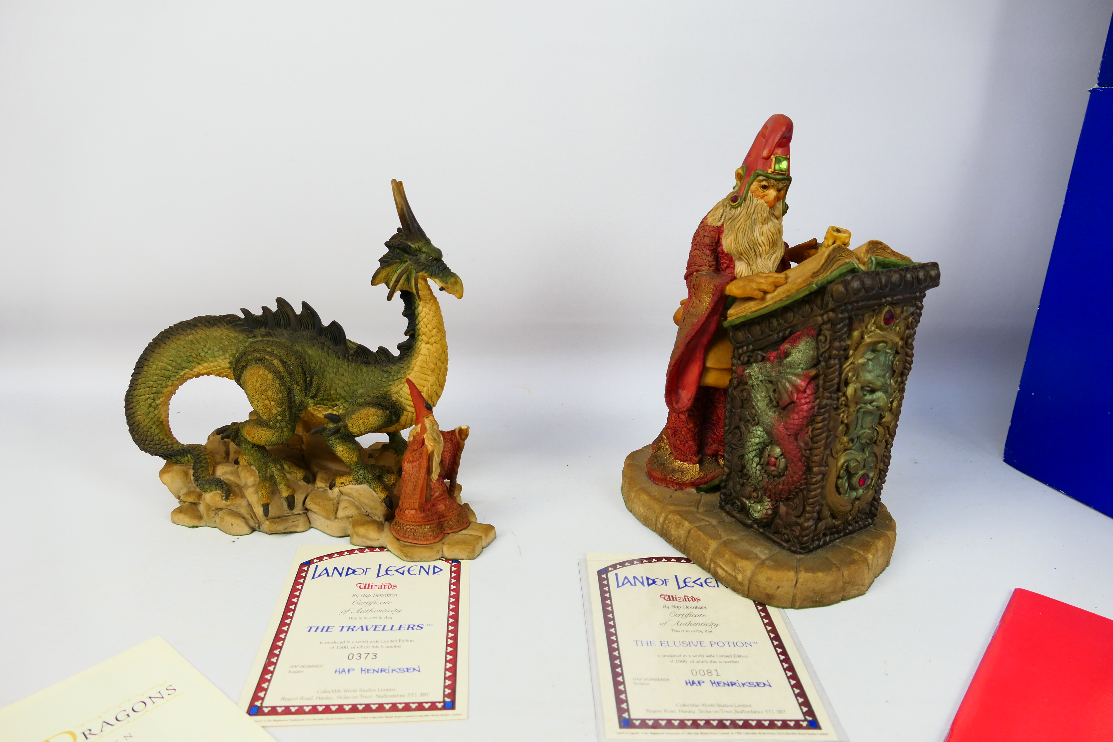 Wizards & Dragons - Two boxed limited edition fantasy figures designed by Hap Henriksen comprising