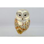 Royal Crown Derby - An owl form paperweight, Winter Owl, gold stopper, approximately 11 cm (h).