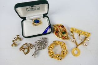 An attractive set of 12k gold filled and faux opal jewellery comprising brooch and ear clips and a