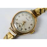 A lady's 9ct gold cased Rotary wrist watch, Arabic numbers and subsidiary seconds dial,