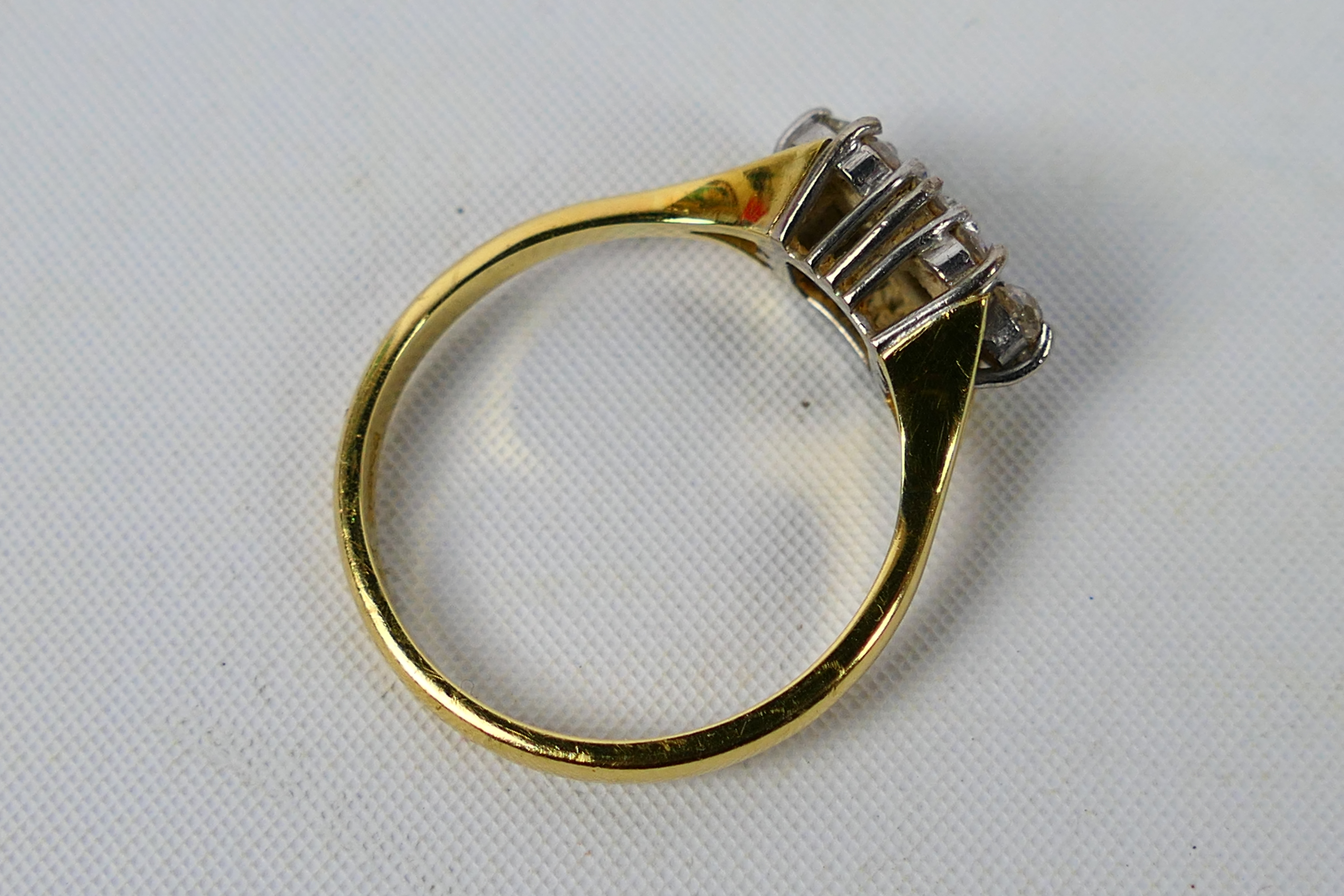 A gold and diamond cluster ring centrally set with four old cut diamonds, - Image 2 of 5