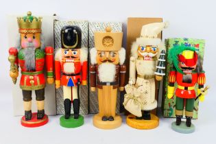 A collection of boxed Erzgebirge traditional handmade wooden figural nutcrackers,