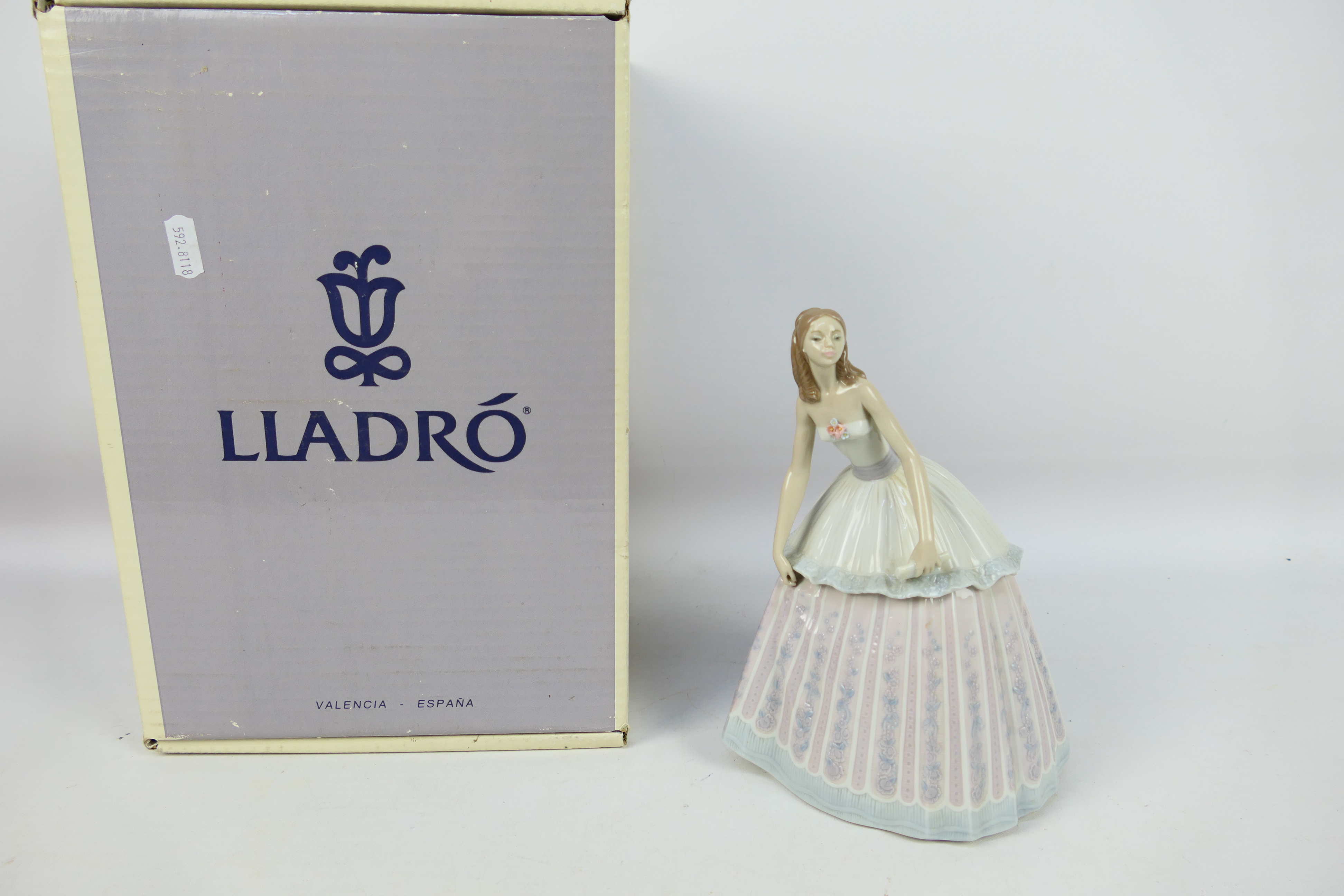 A boxed Lladro figure, Waiting To Dance, # 5858, approximately 22 cm (h).