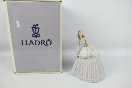 A boxed Lladro figure, Waiting To Dance, # 5858, approximately 22 cm (h).