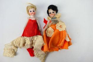 Bisque Mignonette Dolls - 2 x peg jointed all bisque dolls with blue glass eyes and painted