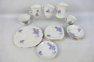 A quantity of floral decorated tea wares