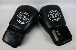 A pair of 16 oz Geezers Palace boxing gl