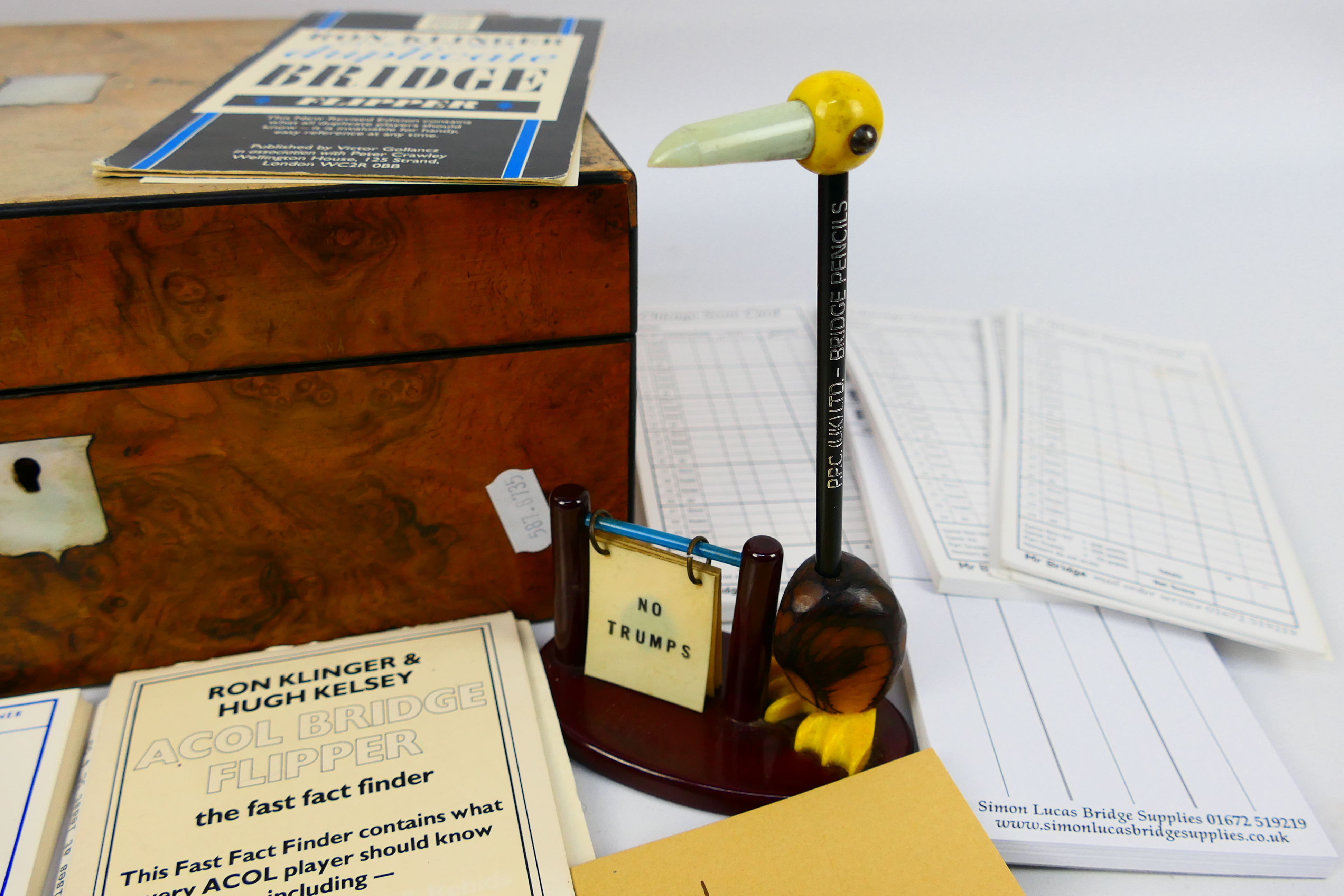 A wooden box containing bridge score cards and similar to include a set of four propelling pencils - Image 5 of 10