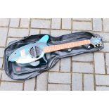 A Tanglewood Shark electric guitar, 3/4 scale with built in speaker contained in carry case.