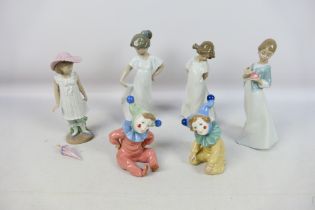 A quantity of Nao figures of young girls and child jesters, largest figure approximately 22 cm (h).