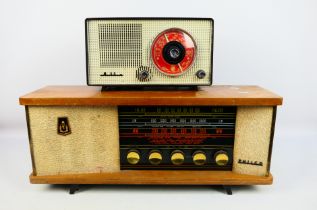 Two vintage radios comprising a Philco Model 100 and a Philips. [2].