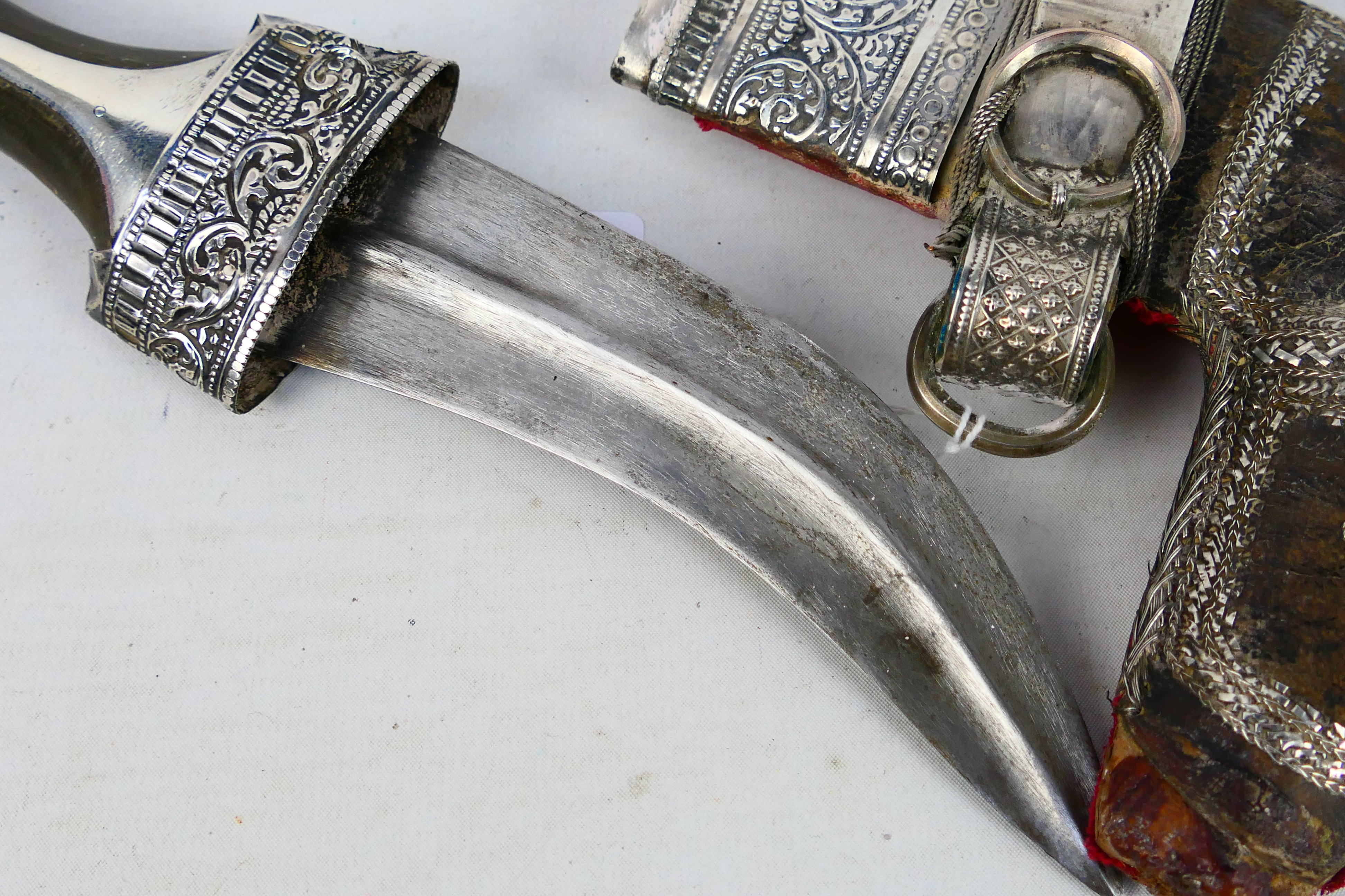 An early 20th century white metal mounted jambiya dagger and scabbard, - Image 3 of 7
